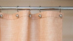 Tringles dans la salle de bain pour rideaux: sélection et installation