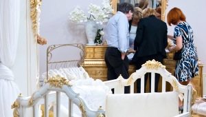 Standardowe rozmiary łóżeczka dla noworodków i subtelności doboru pościeli do spania