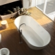 Baignoires en pierre artificielle: caractéristiques techniques et caractéristiques de sélection